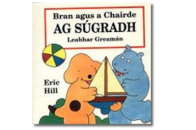 Bran agus a Chairde ag Súgradh - Eric Hill (Leabhar Greamán / Sticker Book)